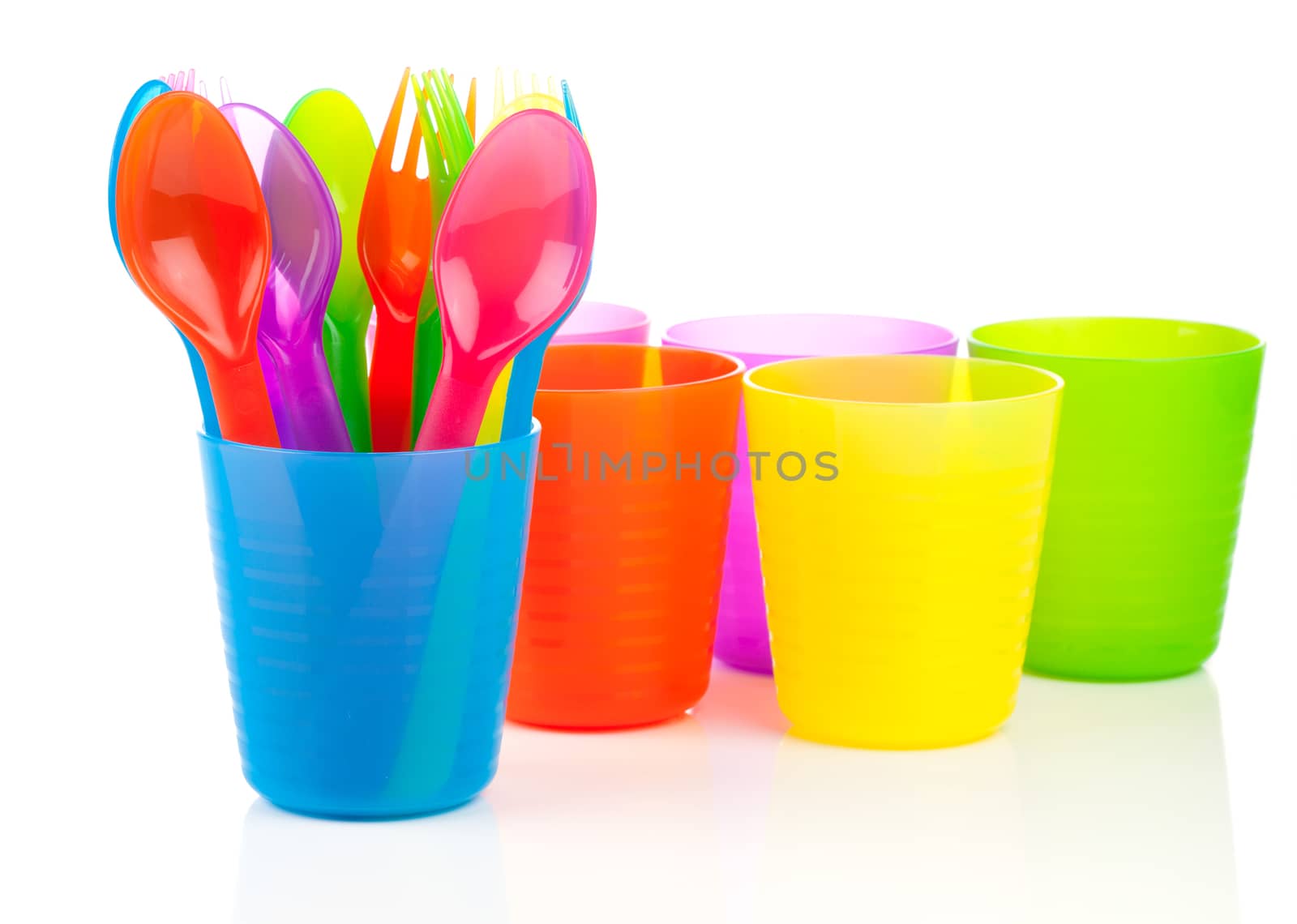 bright plastic tableware, isolated on white background
