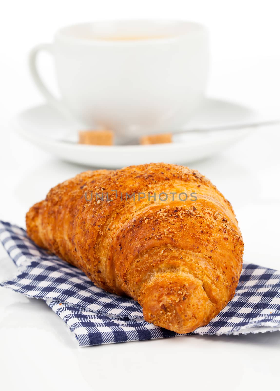 Croissant with caffee cup. Isolated on white backgroun by motorolka