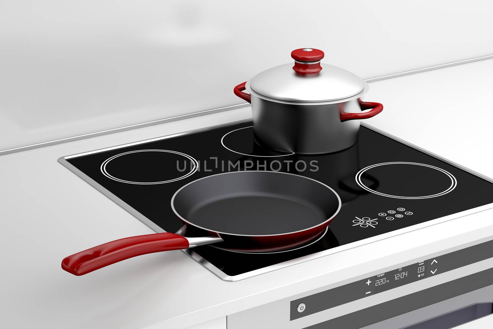 Frying pan and cooking pot at the induction stove