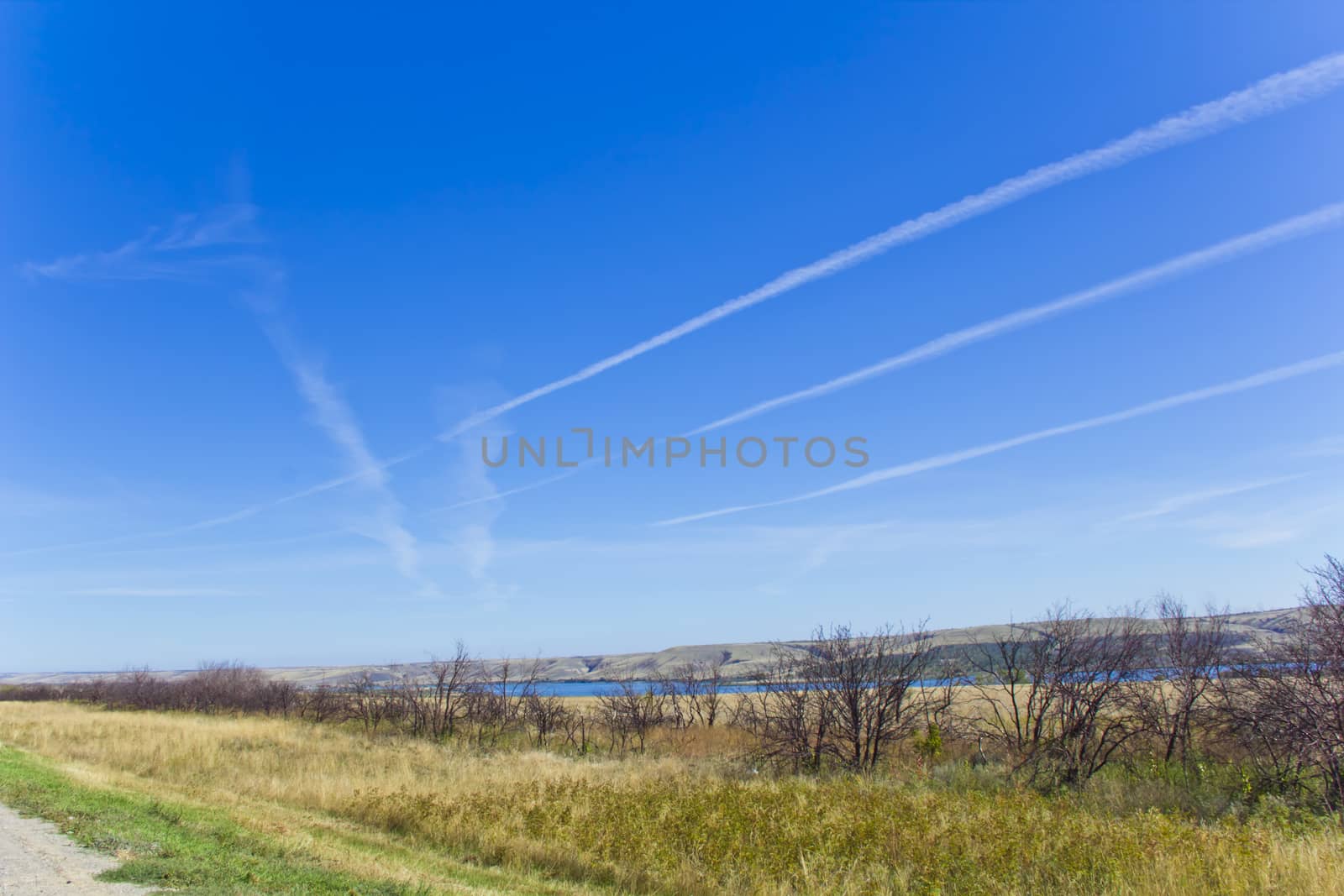Photo of autumn landscape with blue sky