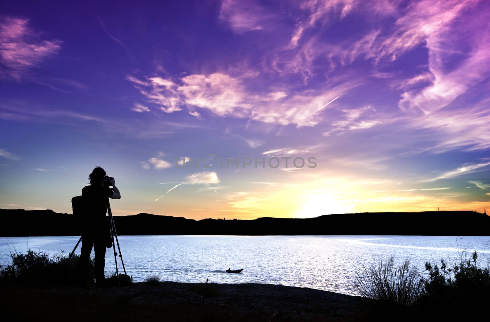 
Photographer in action on a beautiful sunset