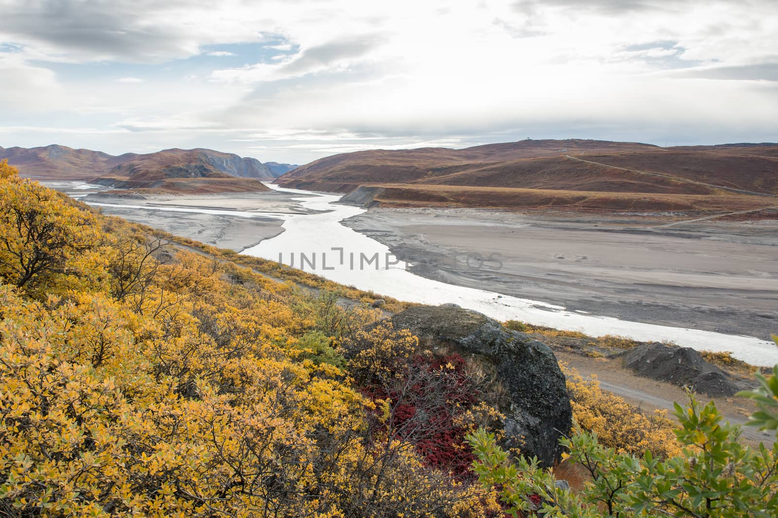 Beautiful autumn landscape in Greenland with river and mountains