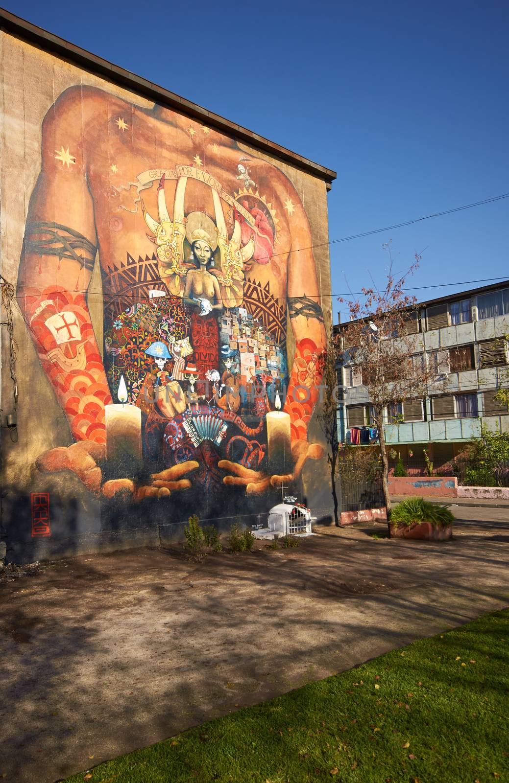 Colourful murals adorning the walls of tenement blocks in the San Miguel area of Santiago, capital of Chile. The area was created as an open air museum in what was a run down area of the city.