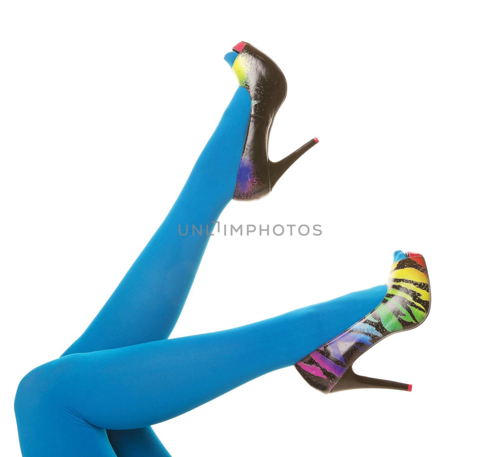 Bright turquoise blue nylon stockings paired with rainbow colored zebra stripe high heels.  Shot on white background.