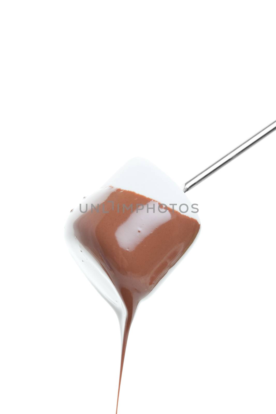 A marshmallow that has just been freshly dipped in warm milk chocolate.  Shot on white background.