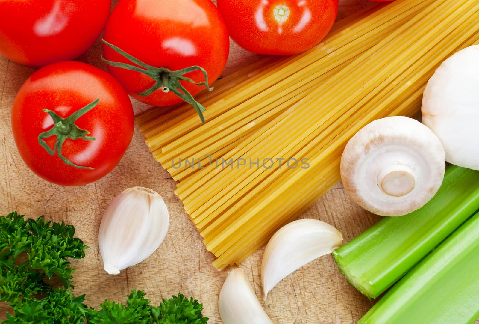 Some of the ingredients needed for cooking Italian food.  