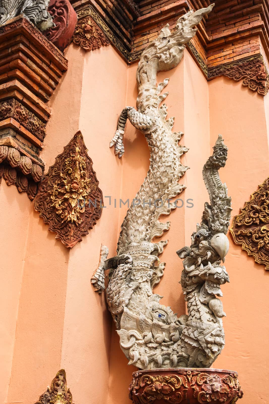 Naga statue, usually stand at the gate or in front of buddist temple in thailand.