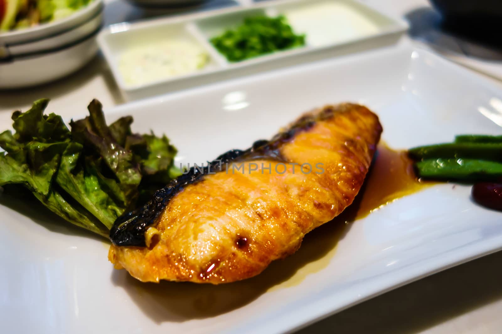 Salmon grilled with a glaze of soy sauce (teriyaki sauce)