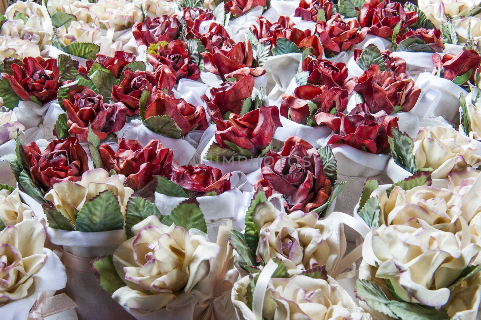 flowers candy and weddings favors on white background