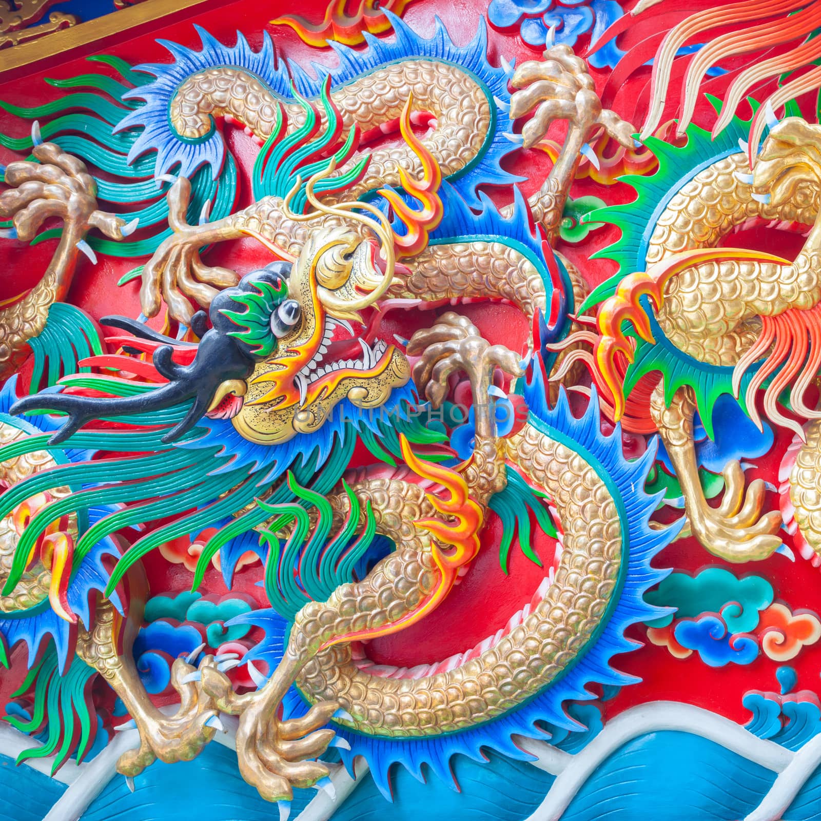 China Dragon statue on the wall background