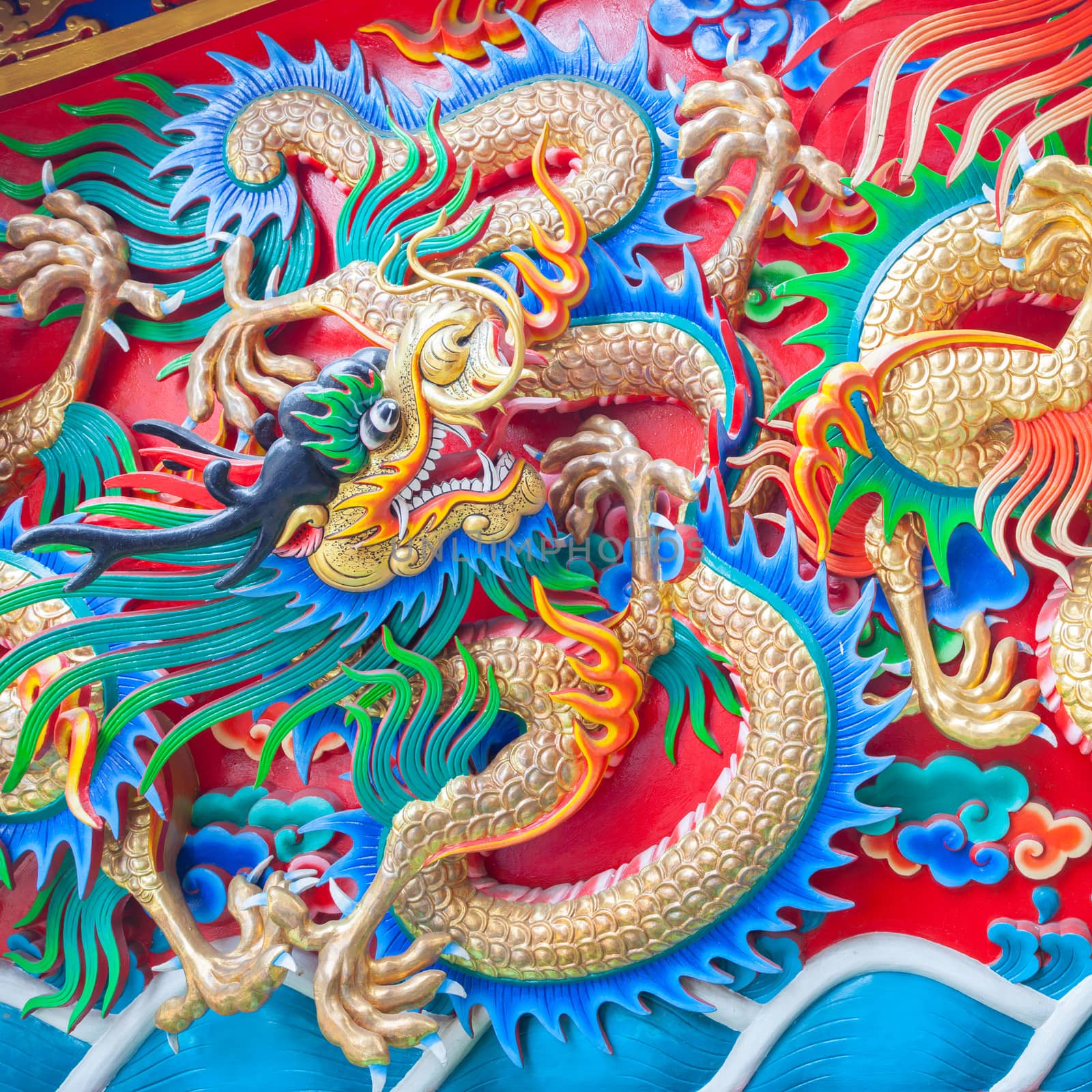 China Dragon statue on the wall background