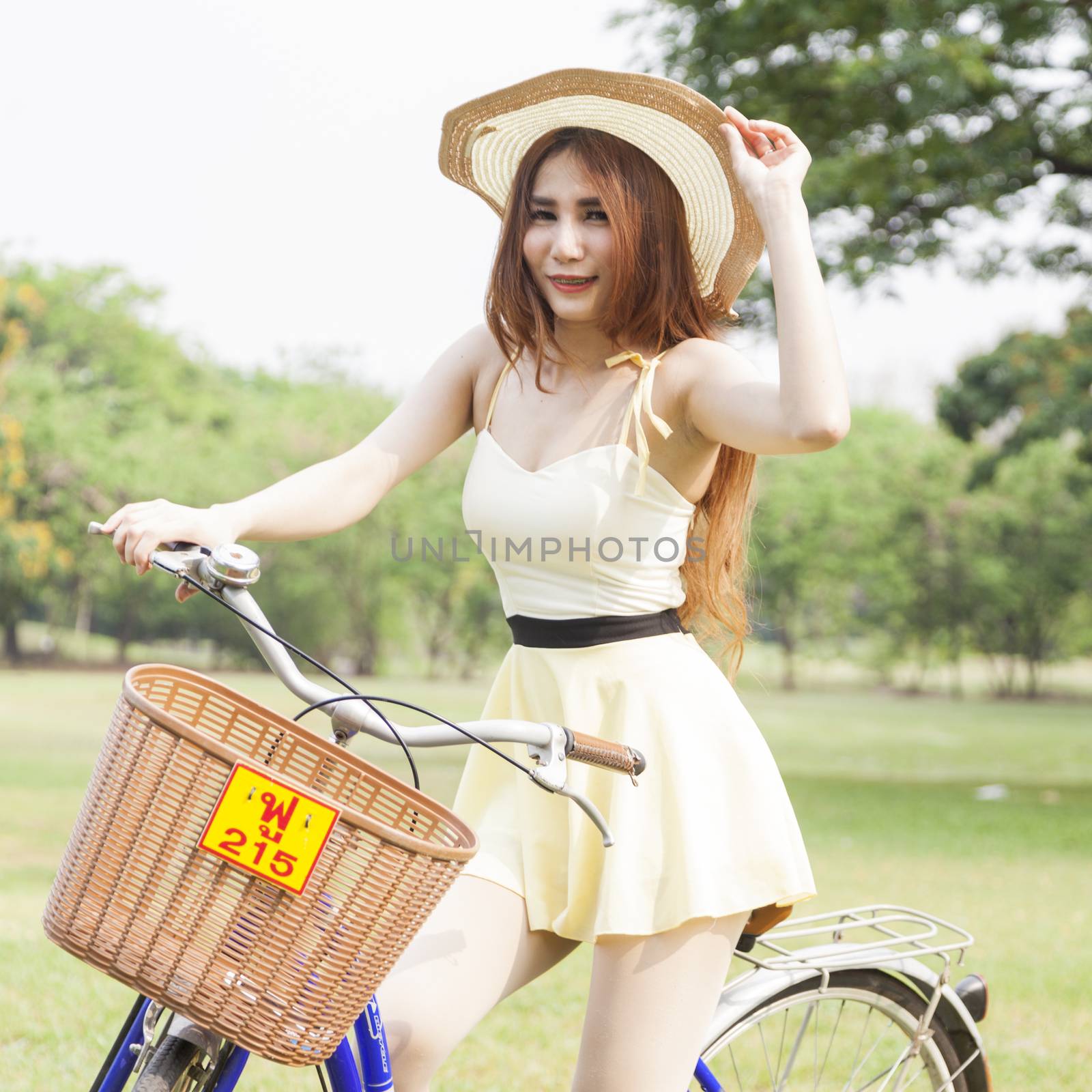 Woman are bicycling by a454
