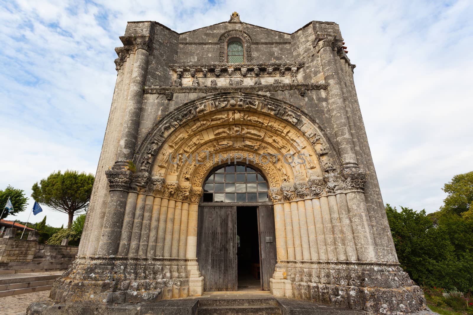West facade view of Notre-Dame de l'Assomption de Fenioux
church in Charente Maritime region of France