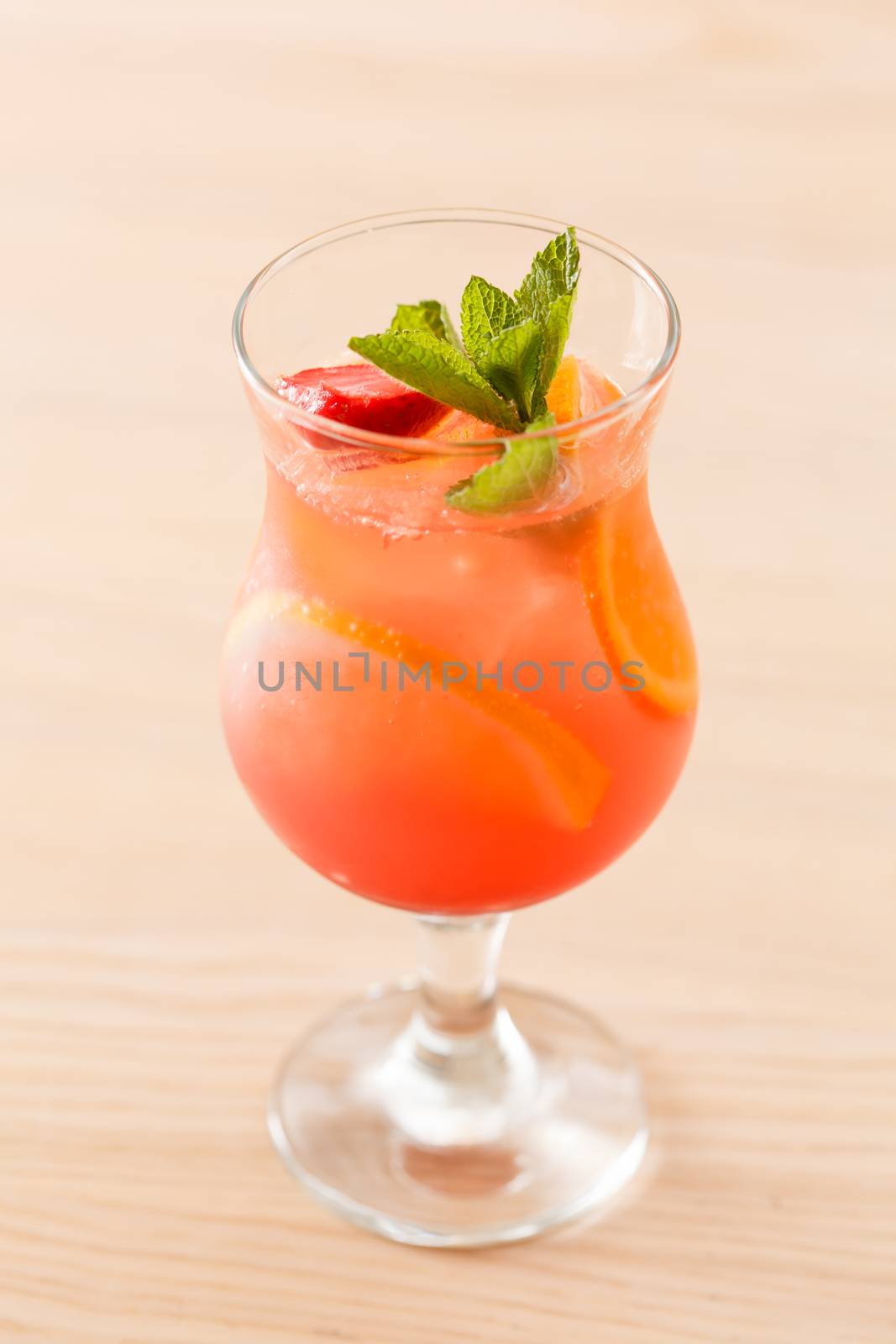 cocktail with orange and strawberry