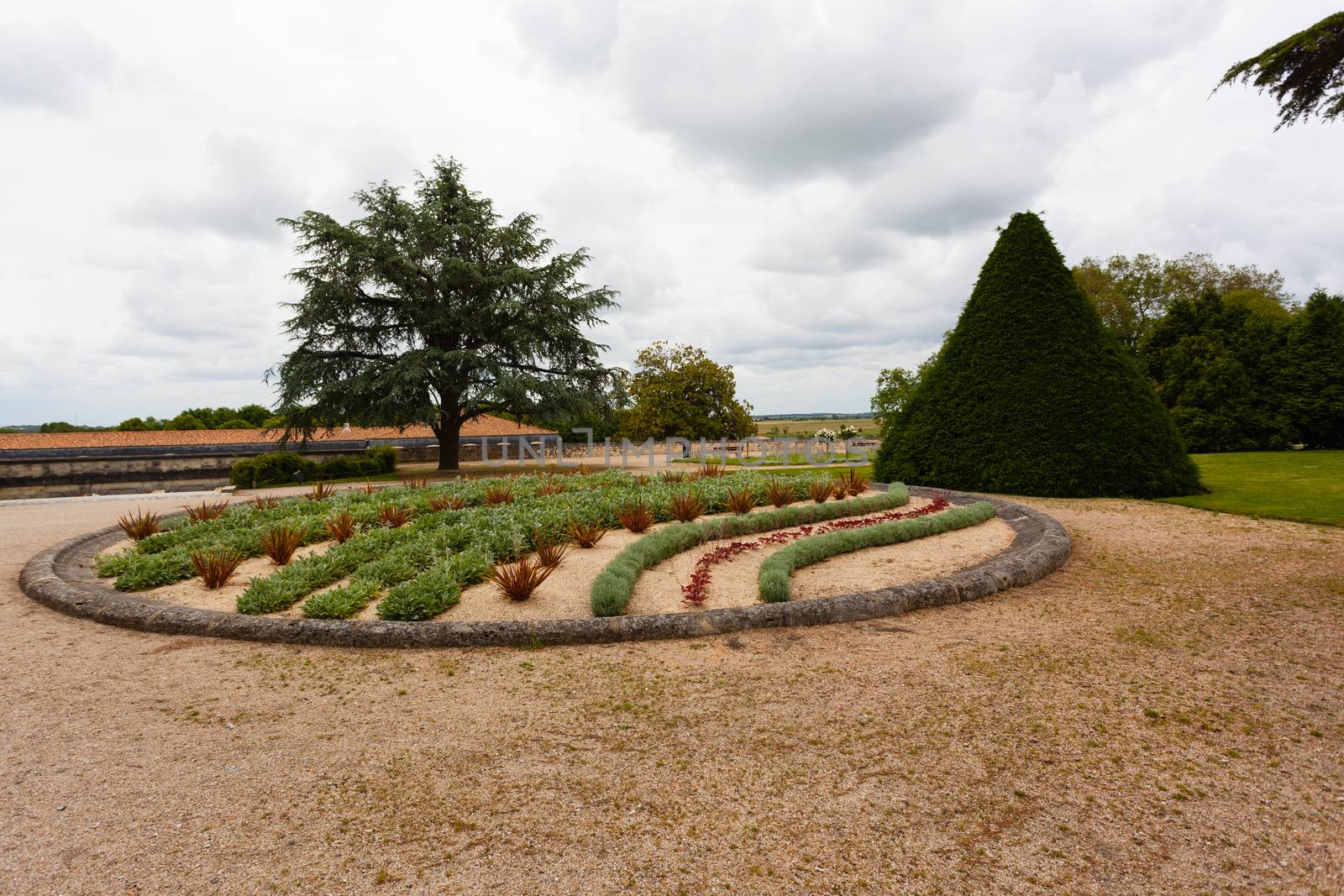 round shape flower bed in the town of Rochefort charente maritime region of France