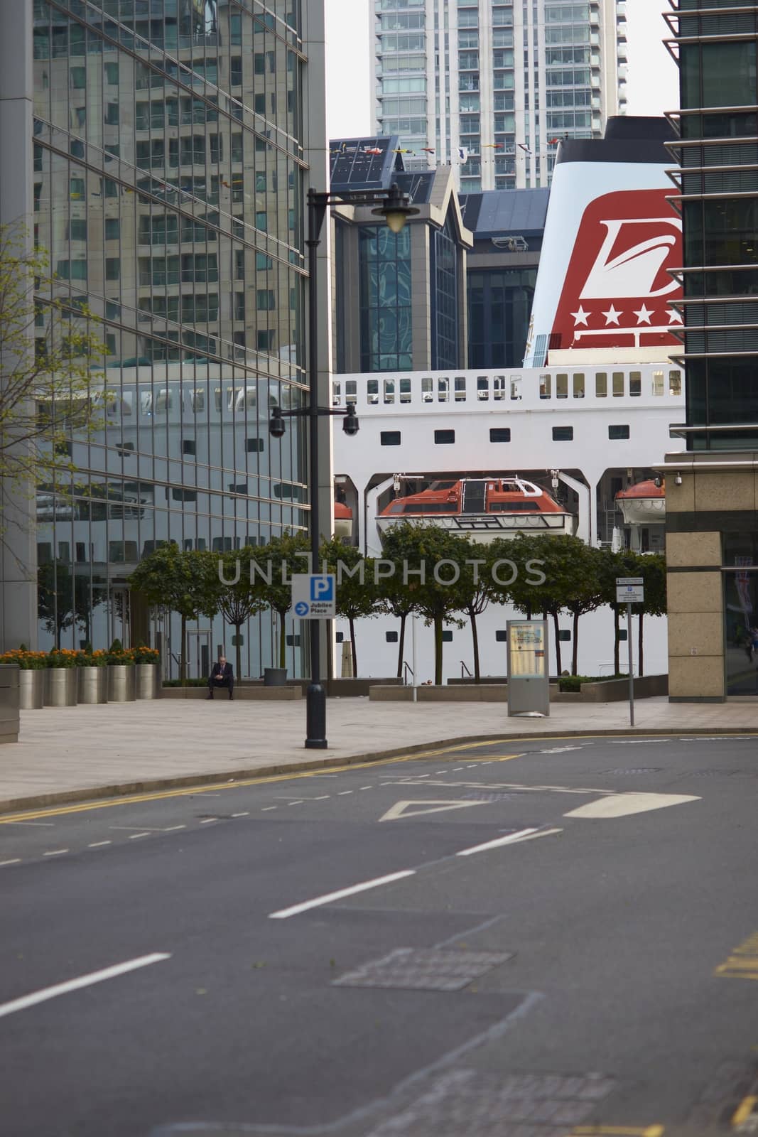 Large ocean going ship moored at Canary Wharf in London.