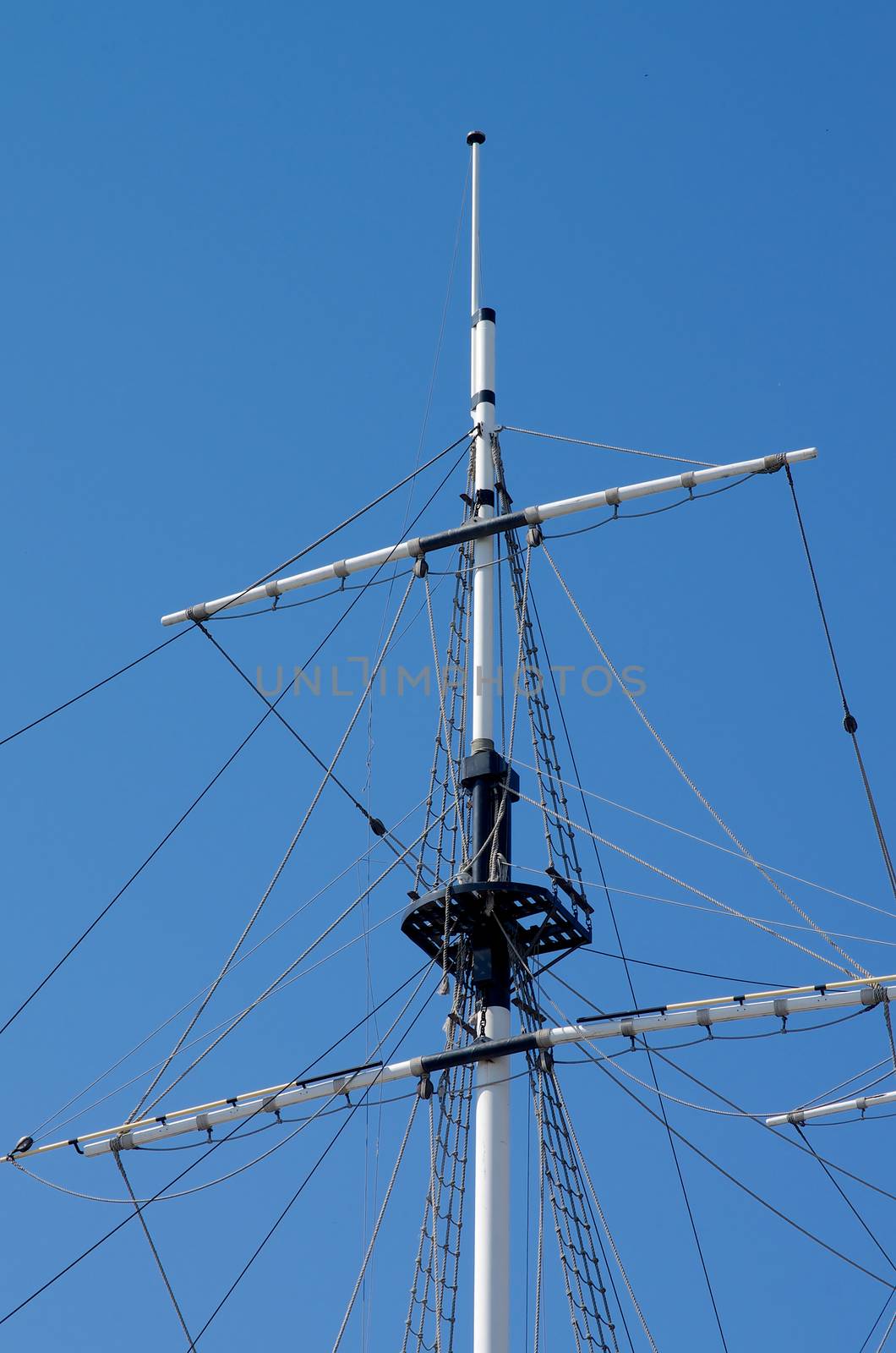 Sailboat Mast isolated on Blue Sky background Outdoors