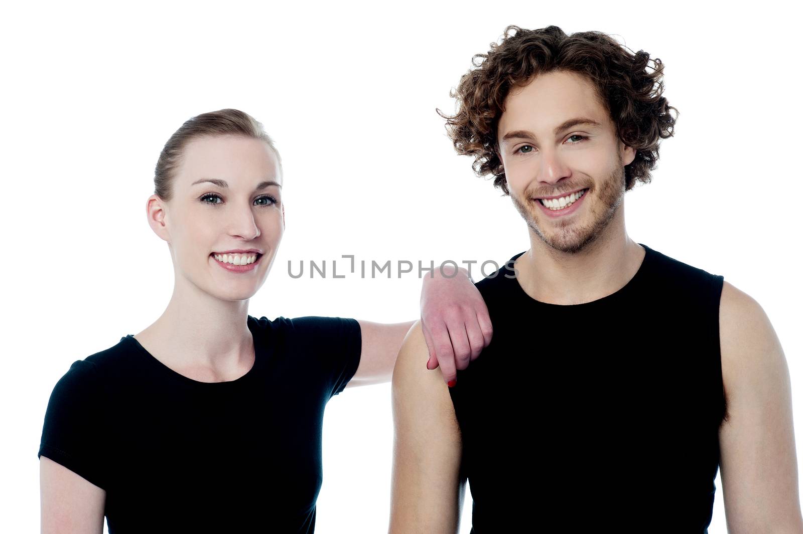 Cheerful young couple posing isolated on white 