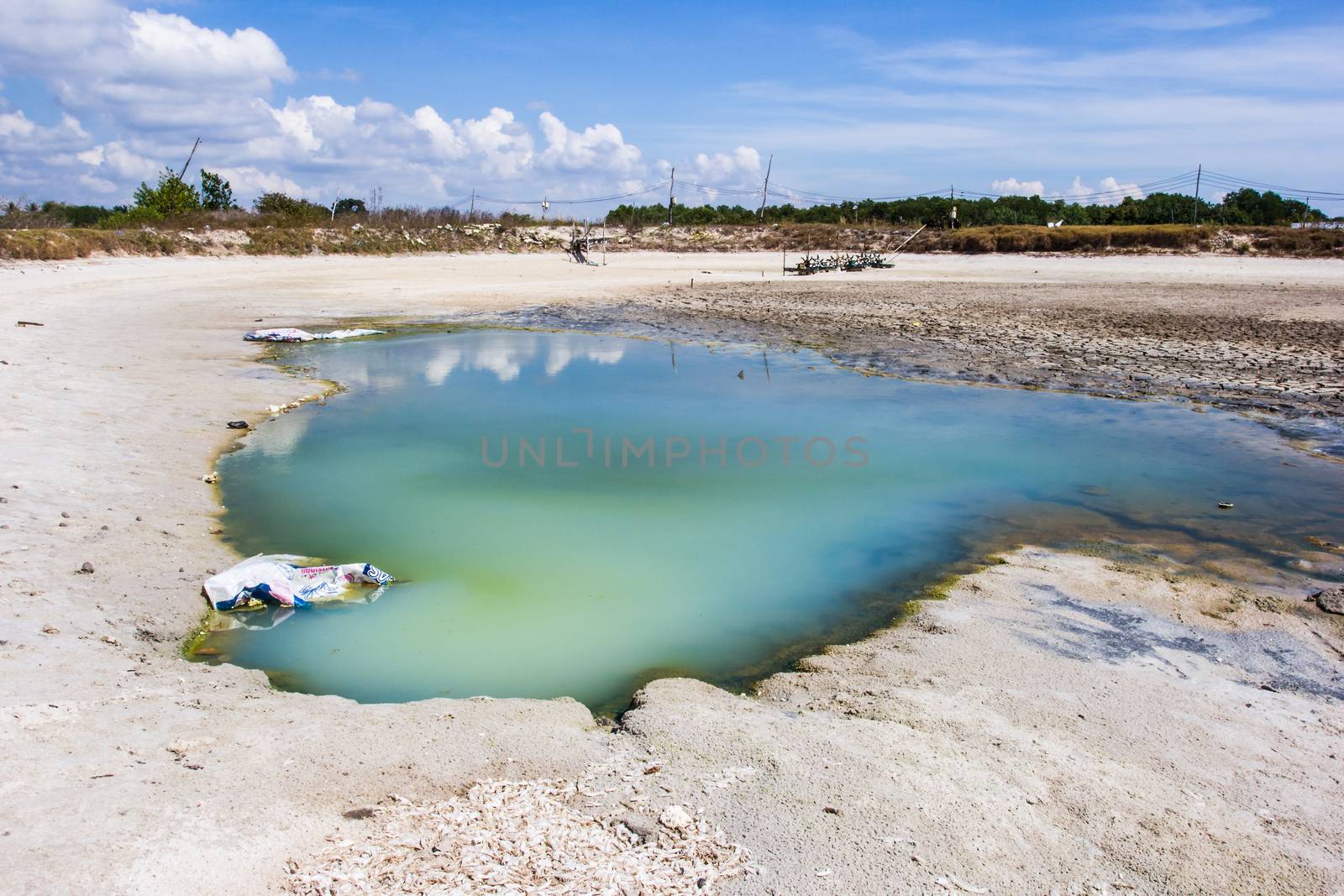 Shrimp ponds droughts and the sky filled with clouds by kannapon