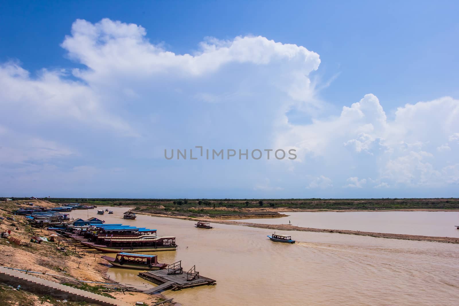 SIEM REAP, CAMBODIA - May 3: Cambodian people live beside Tonle Sap Lake in Siem Reap, Cambodia on May 3, 2014. Tonle Sap is the largest freshwater lake in SE Asia