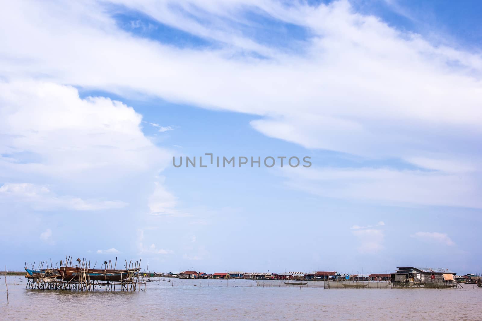 SIEM REAP, CAMBODIA - May 3: Cambodian people live beside Tonle Sap Lake in Siem Reap, Cambodia on May 3, 2014. Tonle Sap is the largest freshwater lake in SE Asia