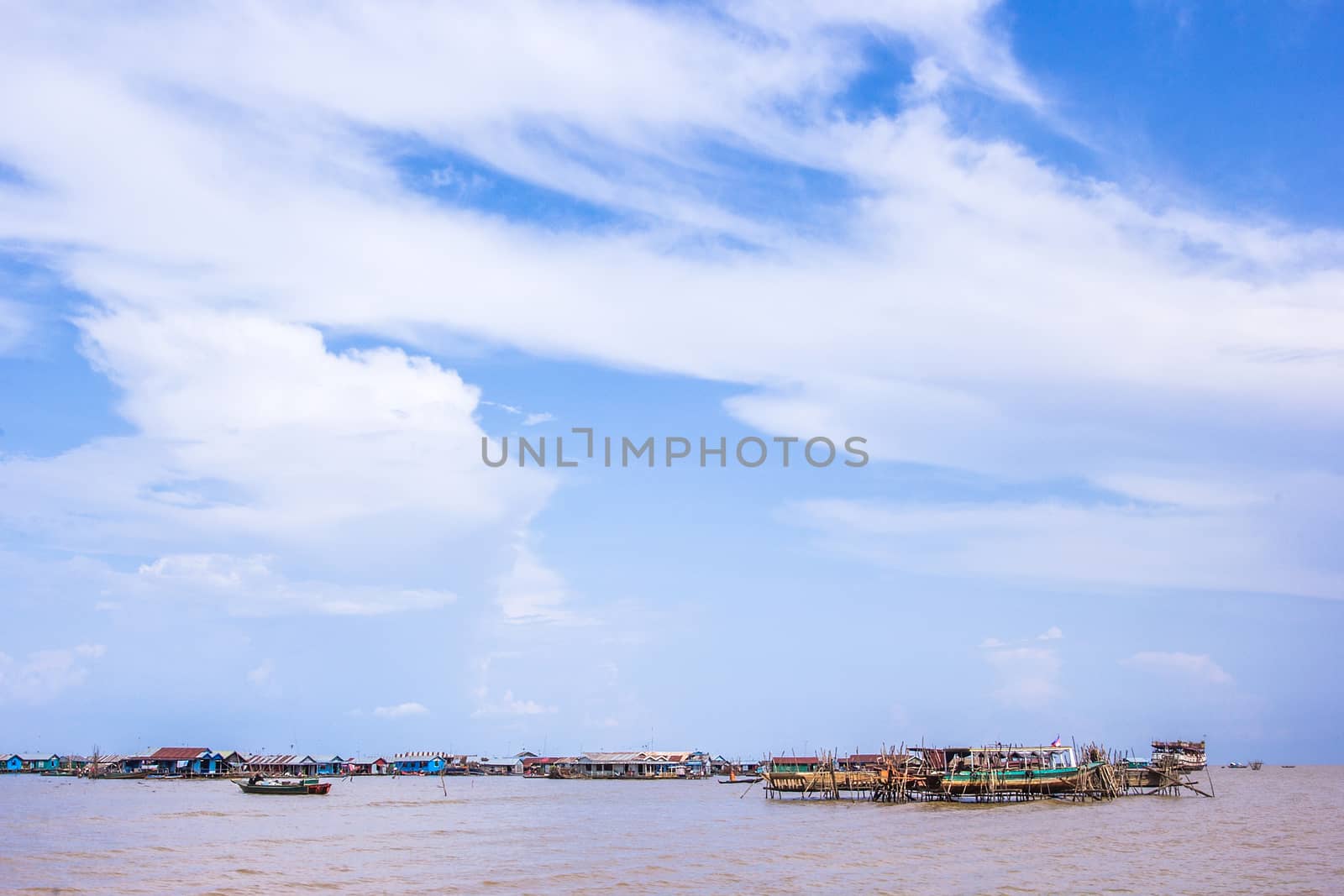 SIEM REAP, CAMBODIA - May 3: Cambodian people live beside Tonle Sap Lake in Siem Reap, Cambodia on May 3, 2014. Tonle Sap is the largest freshwater lake in SE Asia
