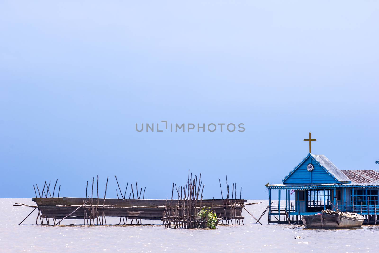 SIEM REAP, CAMBODIA - May 3: This is church of fishing village at Tonle Sap Lake in Siem Reap, Cambodia on May 3, 2014. Tonle Sap is the largest freshwater lake in SE Asia