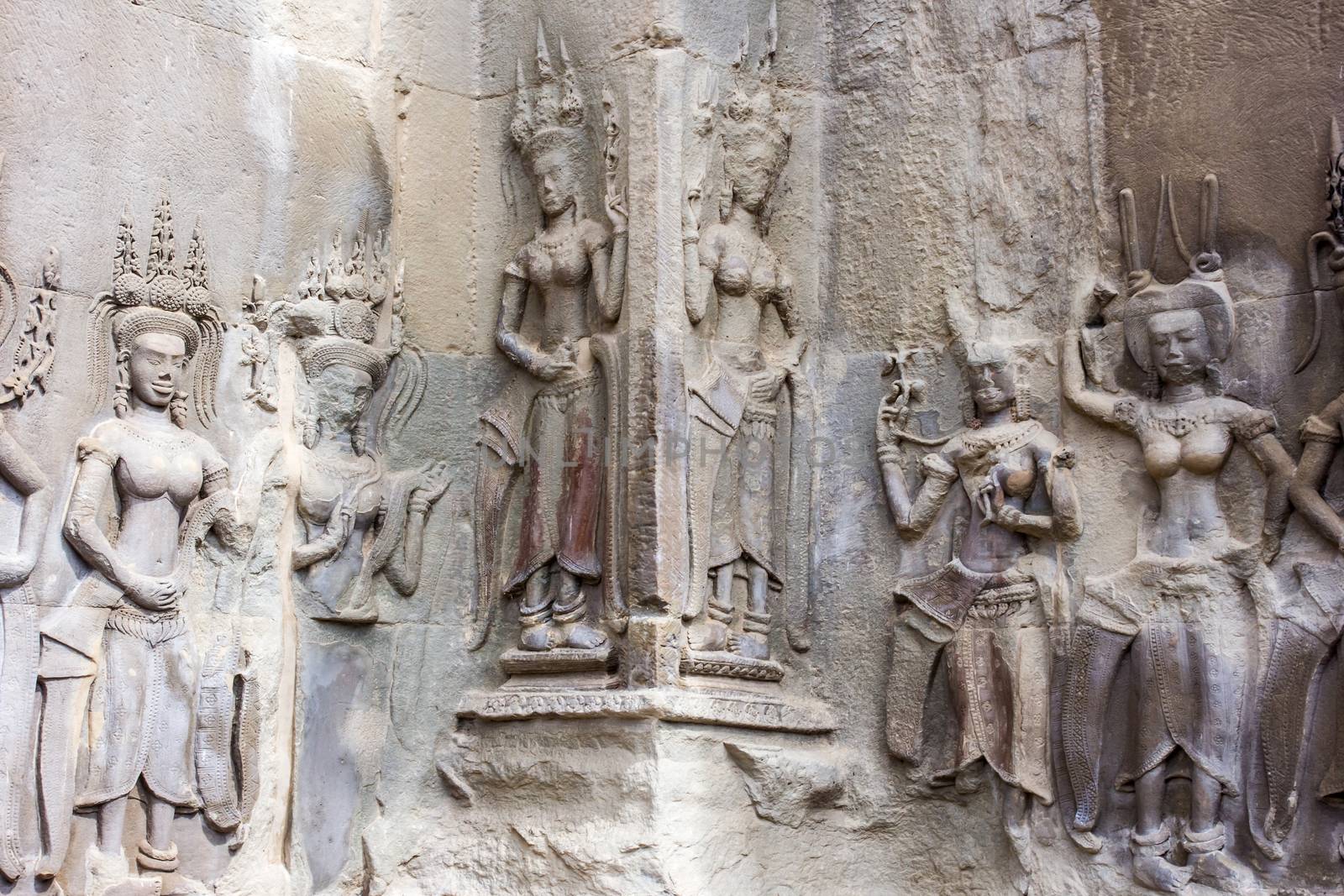 Apsara Dancers Stone Carving,all around on the wall at Angkor wat.