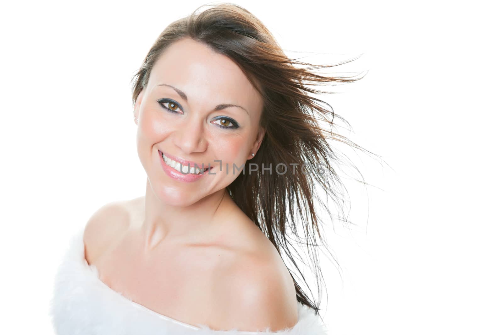 Portrait of a beautiful, mixed race, thirty year-old woman, with a big gorgeous smile.  Shot on white background.