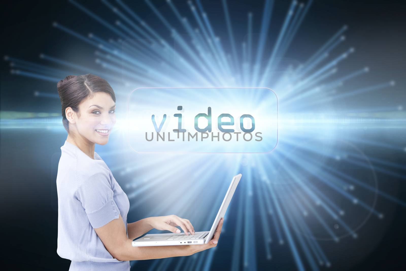 The word video and cheerful businesswoman using a laptop against abstract technology background