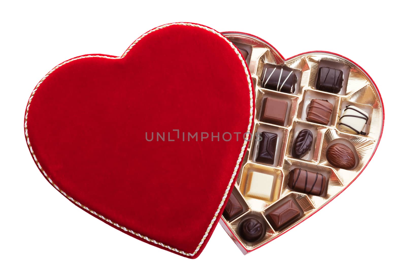 Red velvet, heart shaped box of chocolates.  Shot on white background.