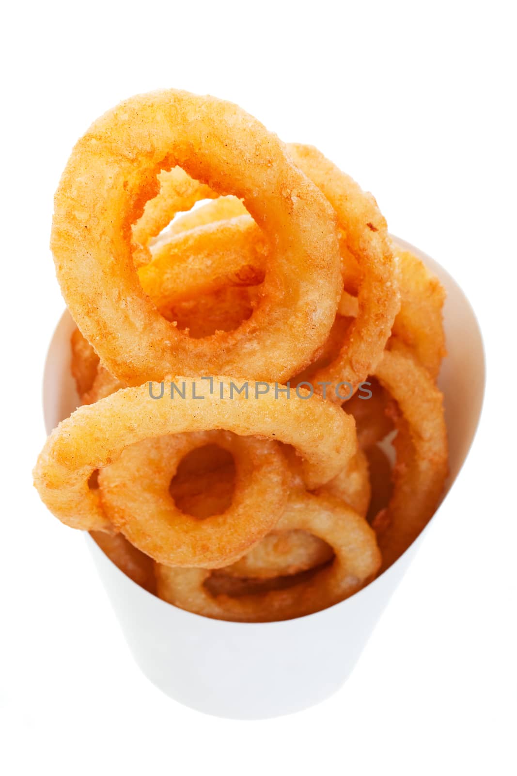 Golden brown, deep fried onion rings in a generic takeout container.  Shot on white background.