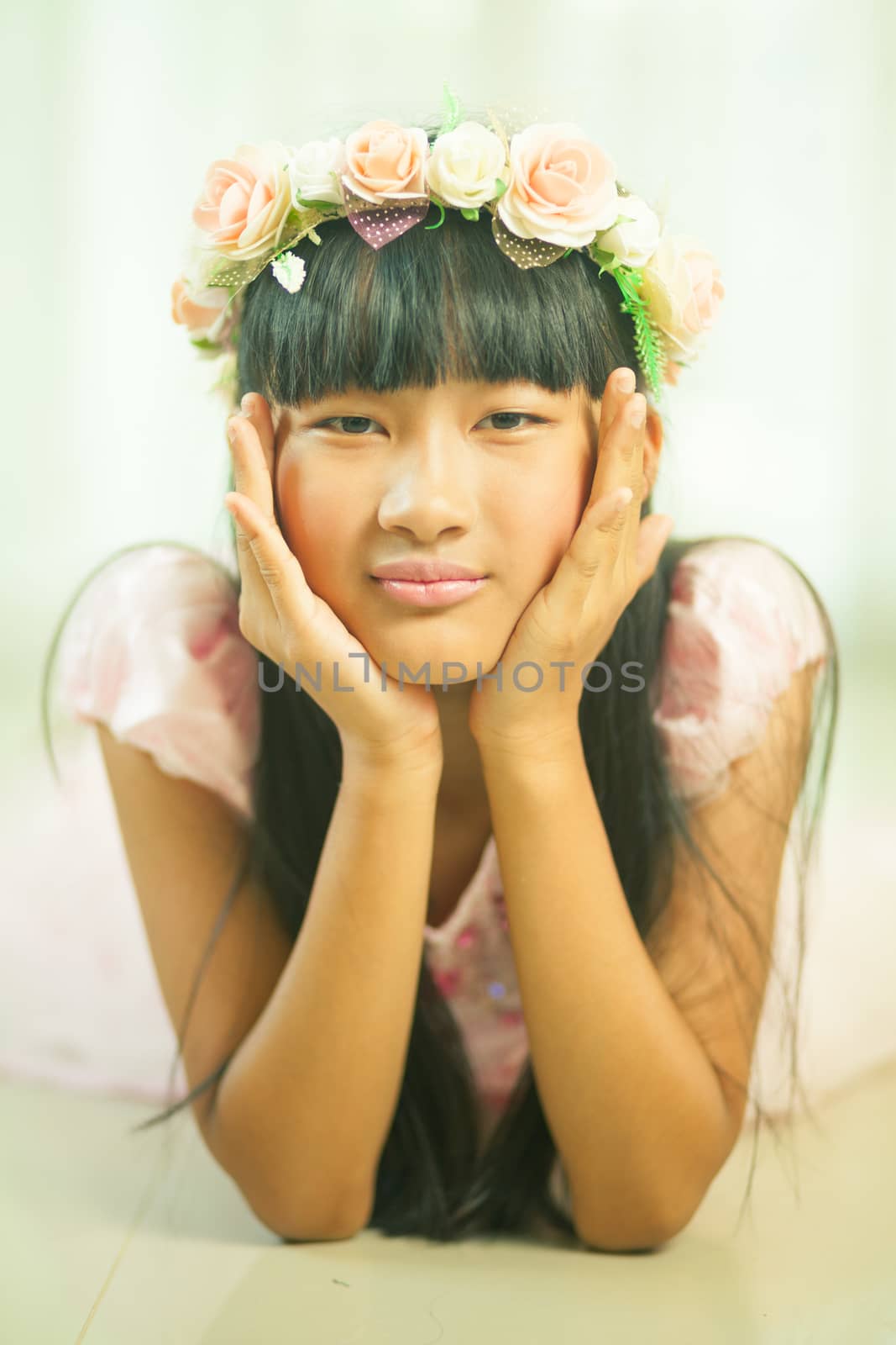 Portrait of a beautiful asian girl with flower crown