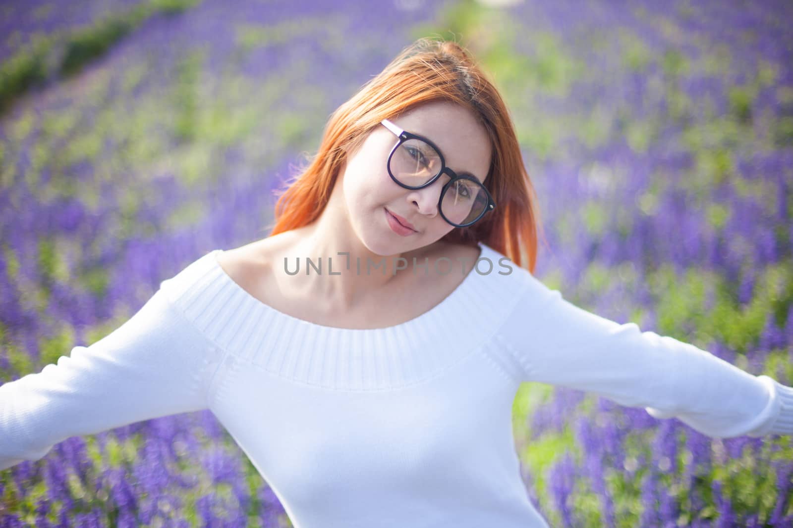 Beautiful asian girl on the lavender field