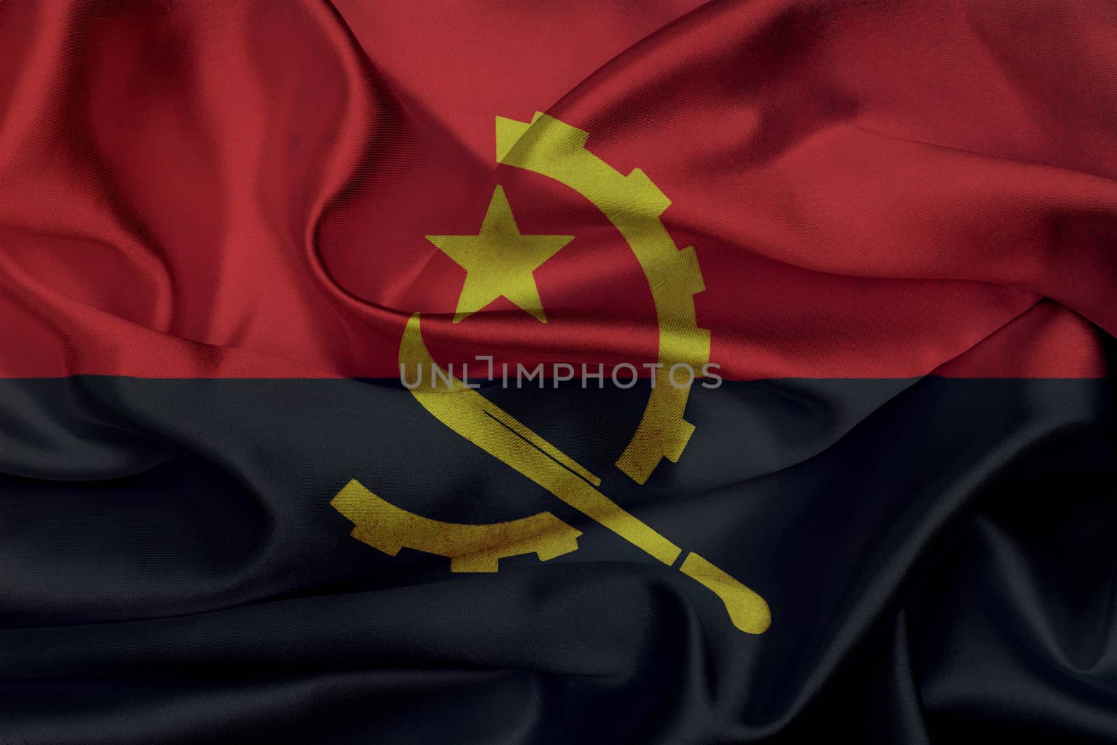 Angola grunge waving flag