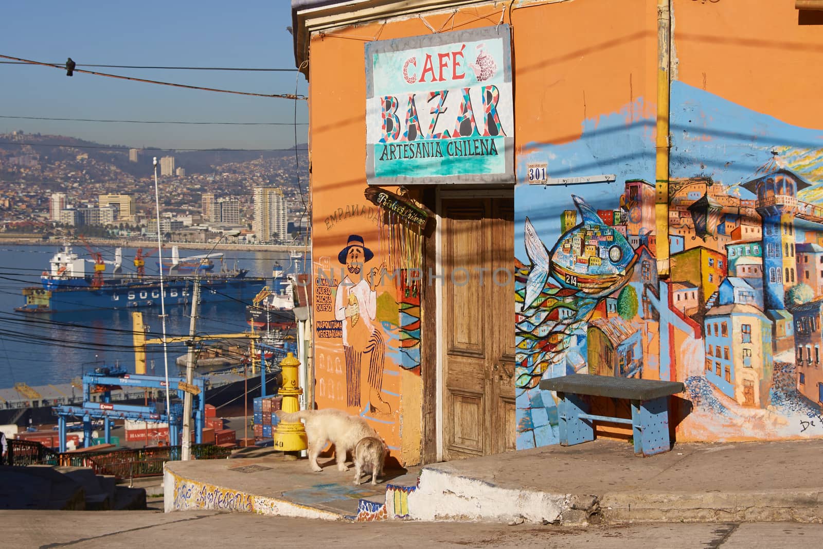 Colourfully decorated cafe overlooking the harbour in the world heritage city of Valparaiso in Chile