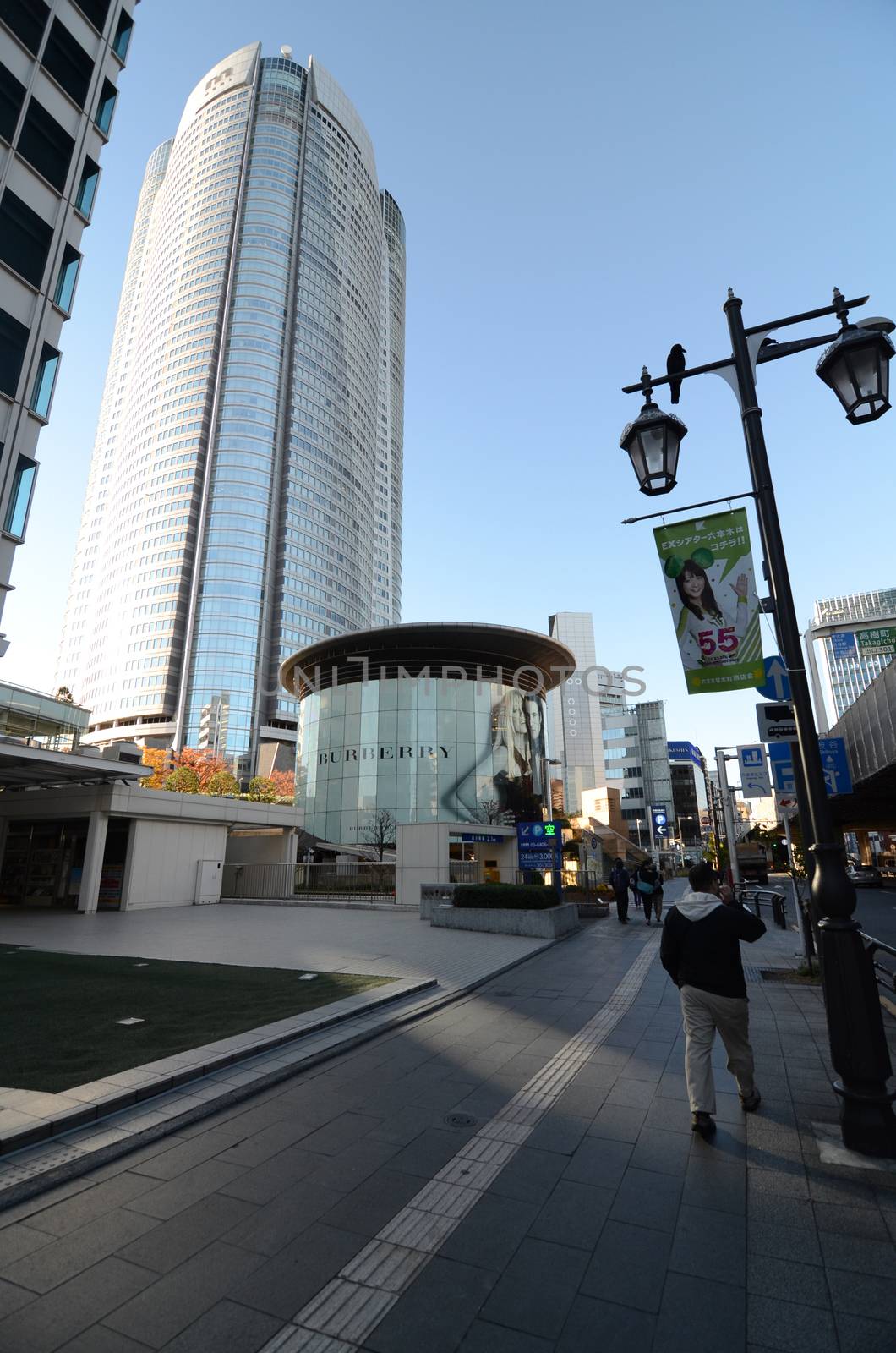 TOKYO, JAPAN - NOVEMBER 23: People visit the  Mori Tower in Roppongi by siraanamwong