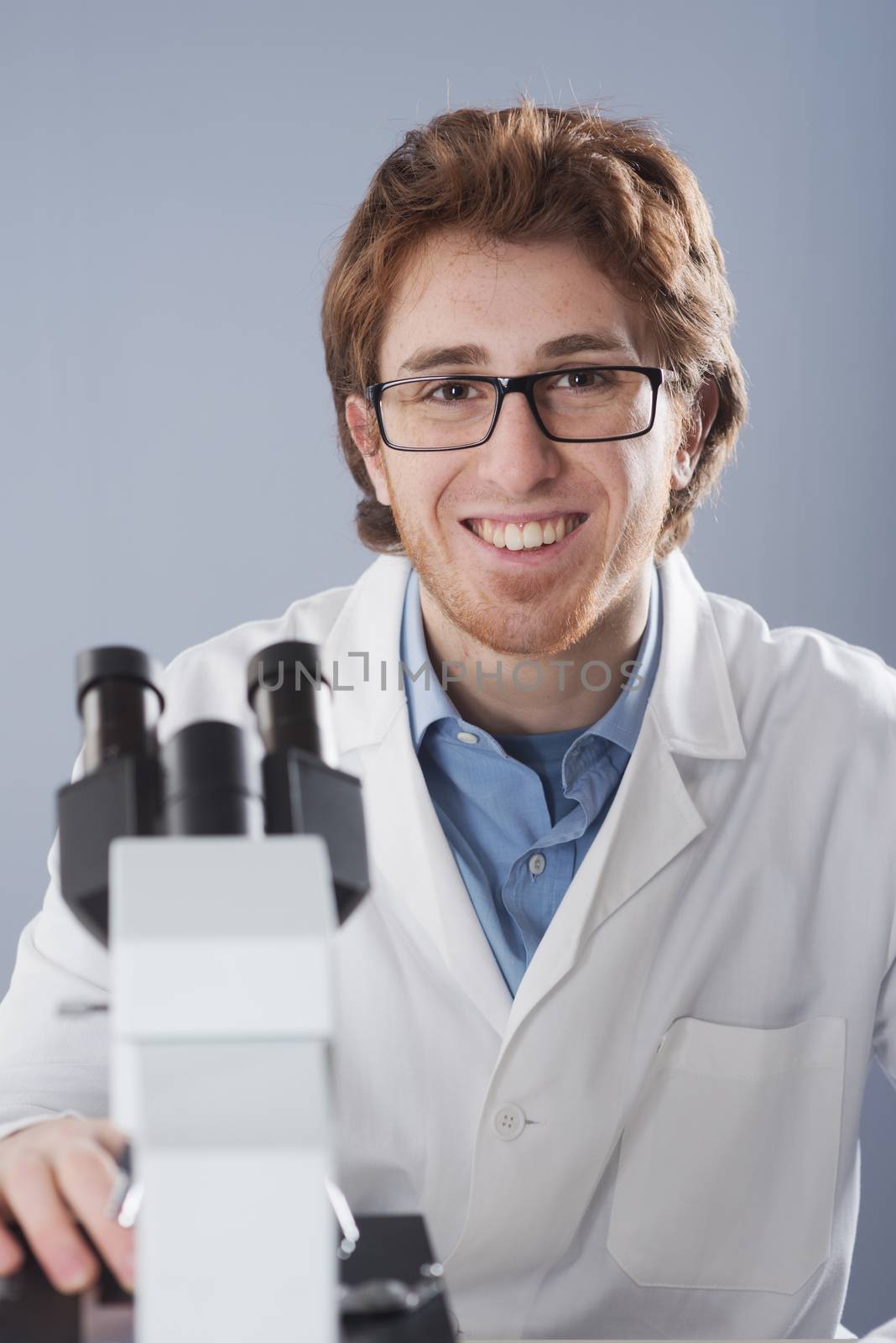 Young researcher in the laboratory by stokkete