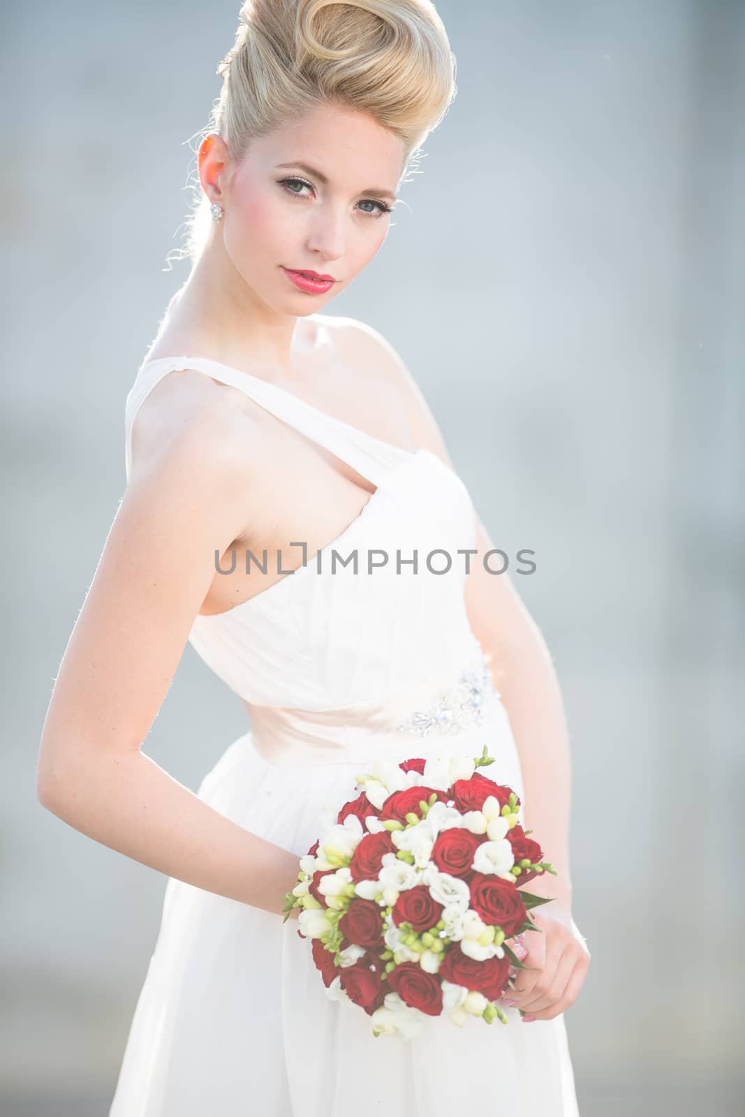 Gorgeous bride on her wedding day (color toned image; shallow DOF)