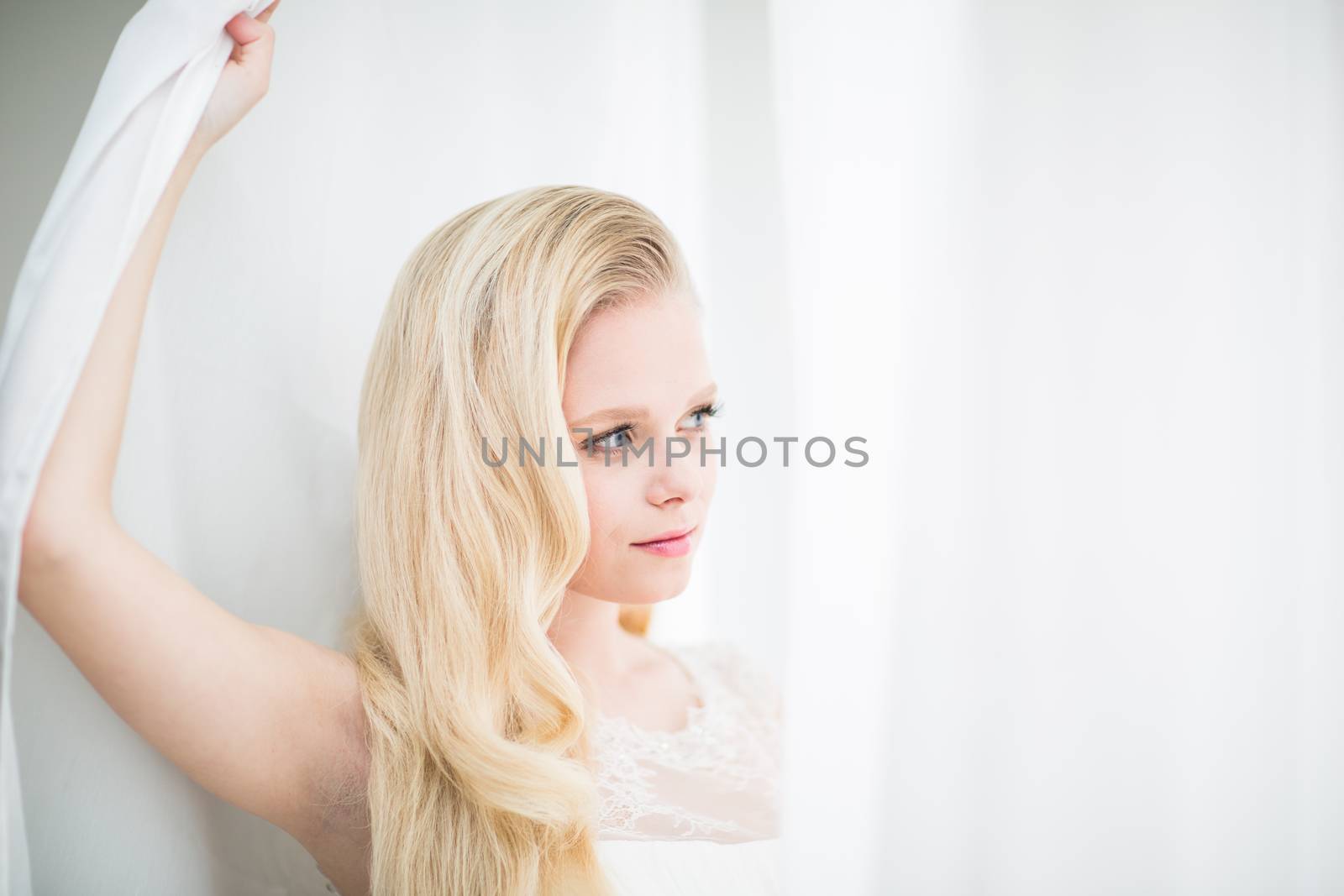 Gorgeous bride on her wedding day (color toned image; shallow DOF)