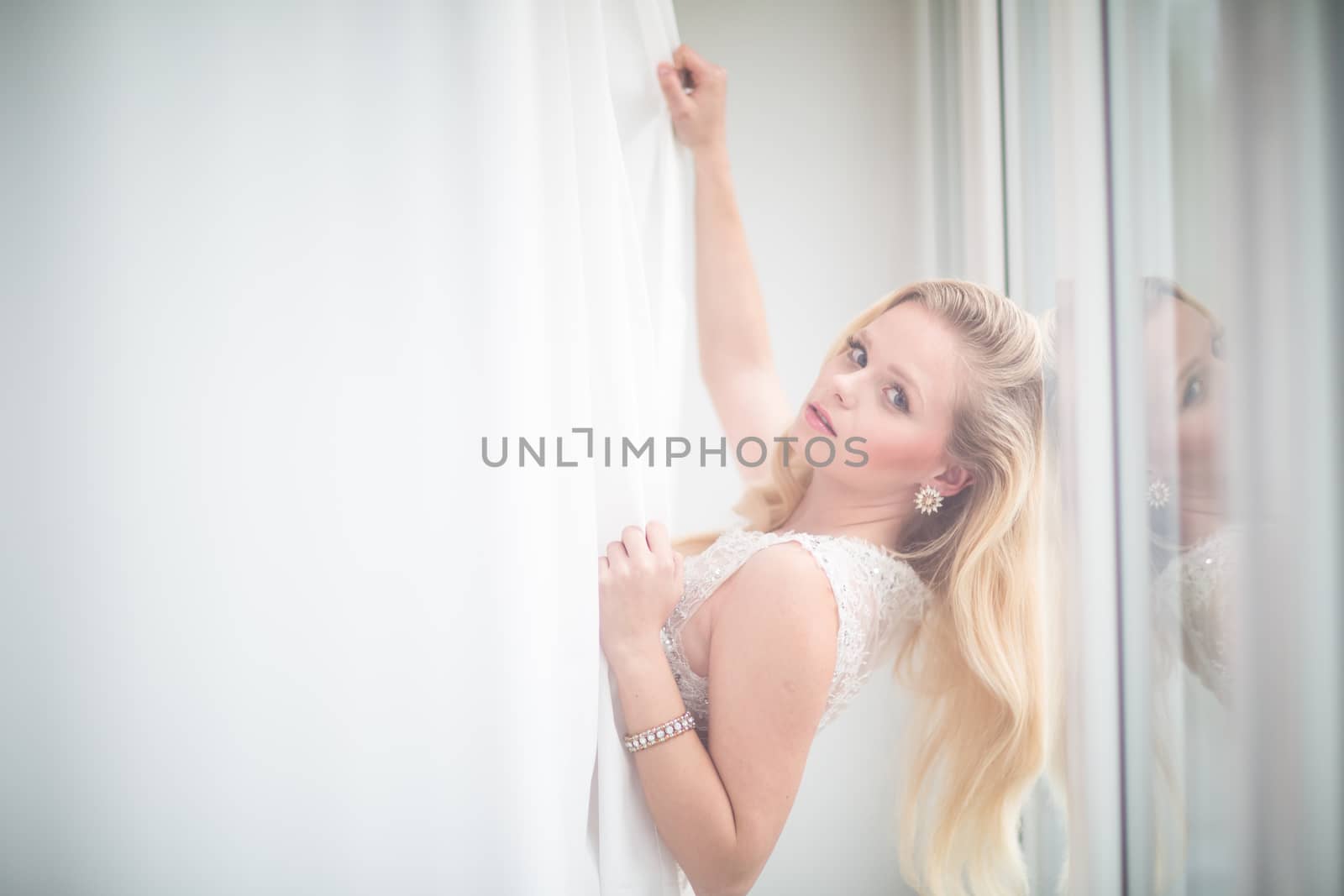 Gorgeous bride on her wedding day (color toned image; shallow DOF)