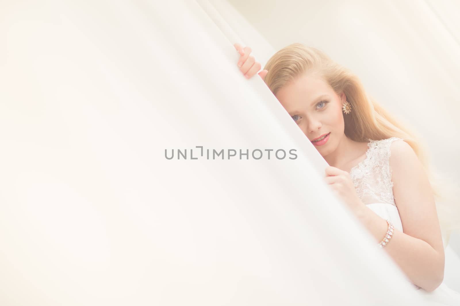 Gorgeous bride on her wedding day (color toned image; shallow DOF)