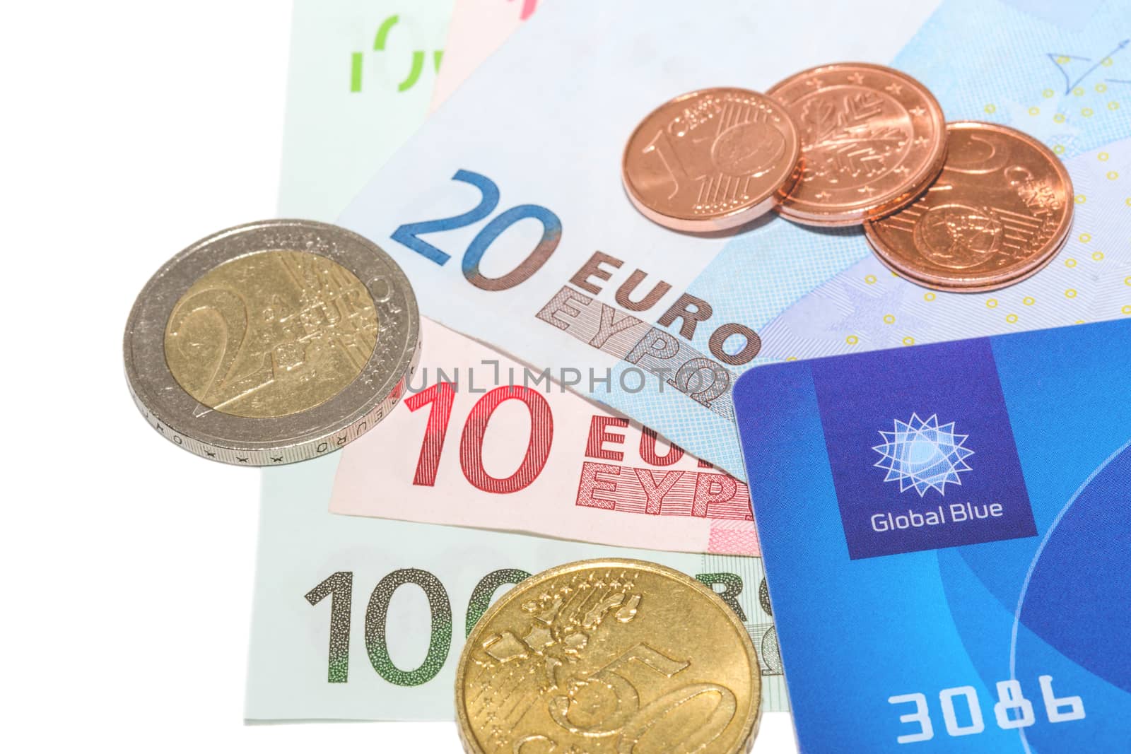 MUNICH, GERMANY - FEBRUARY 23, 2014: Global Blue company Tax Free card with European money. Isolate on white.