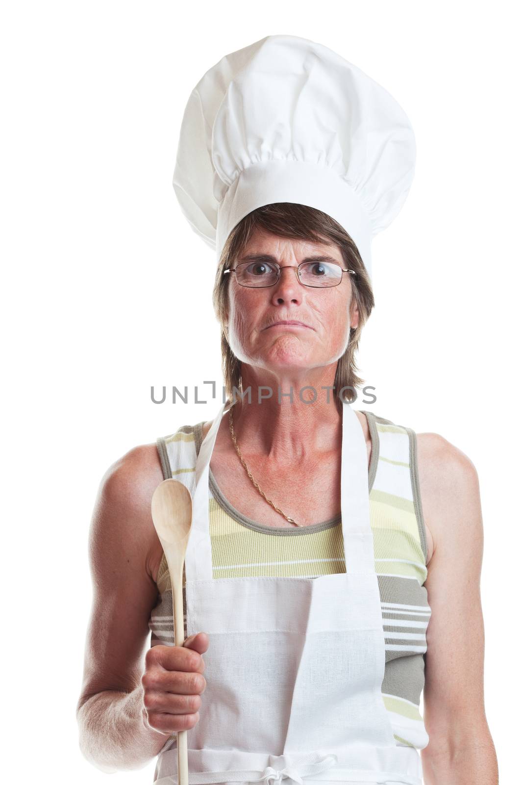 A portrait of a stern chef who rules the kitchen with an iron fist.  Shot on white background.