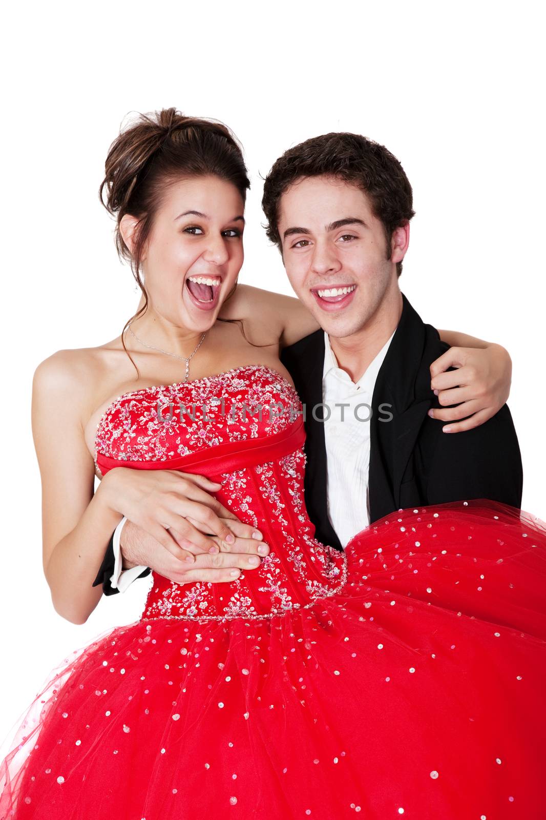 A young man sweeps his prom date off her feet.