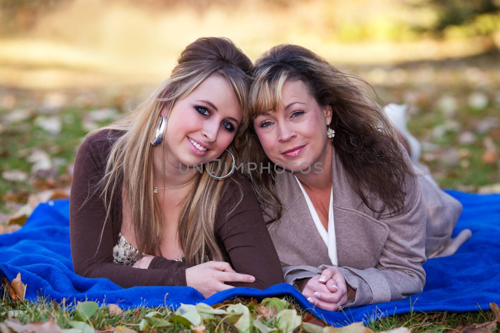 Fall portrait of a mother and daughter.