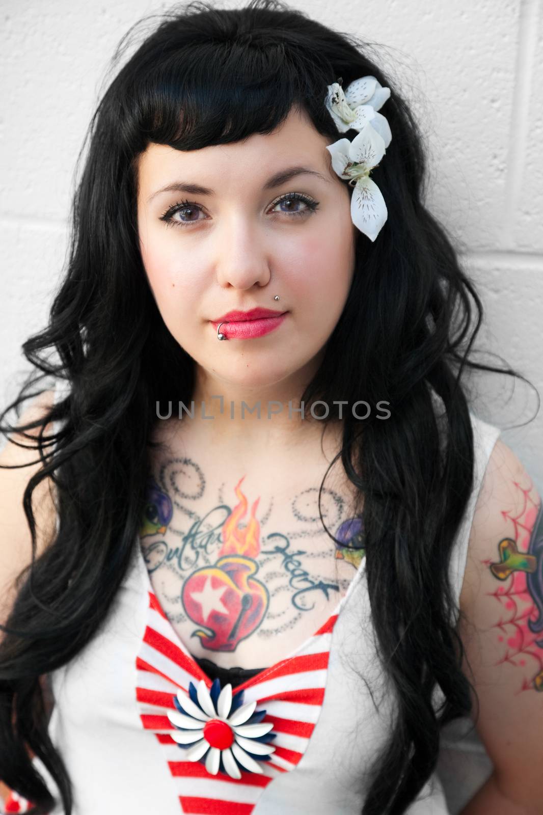 Portrait of a young girl dressed in Rockabilly fashion.