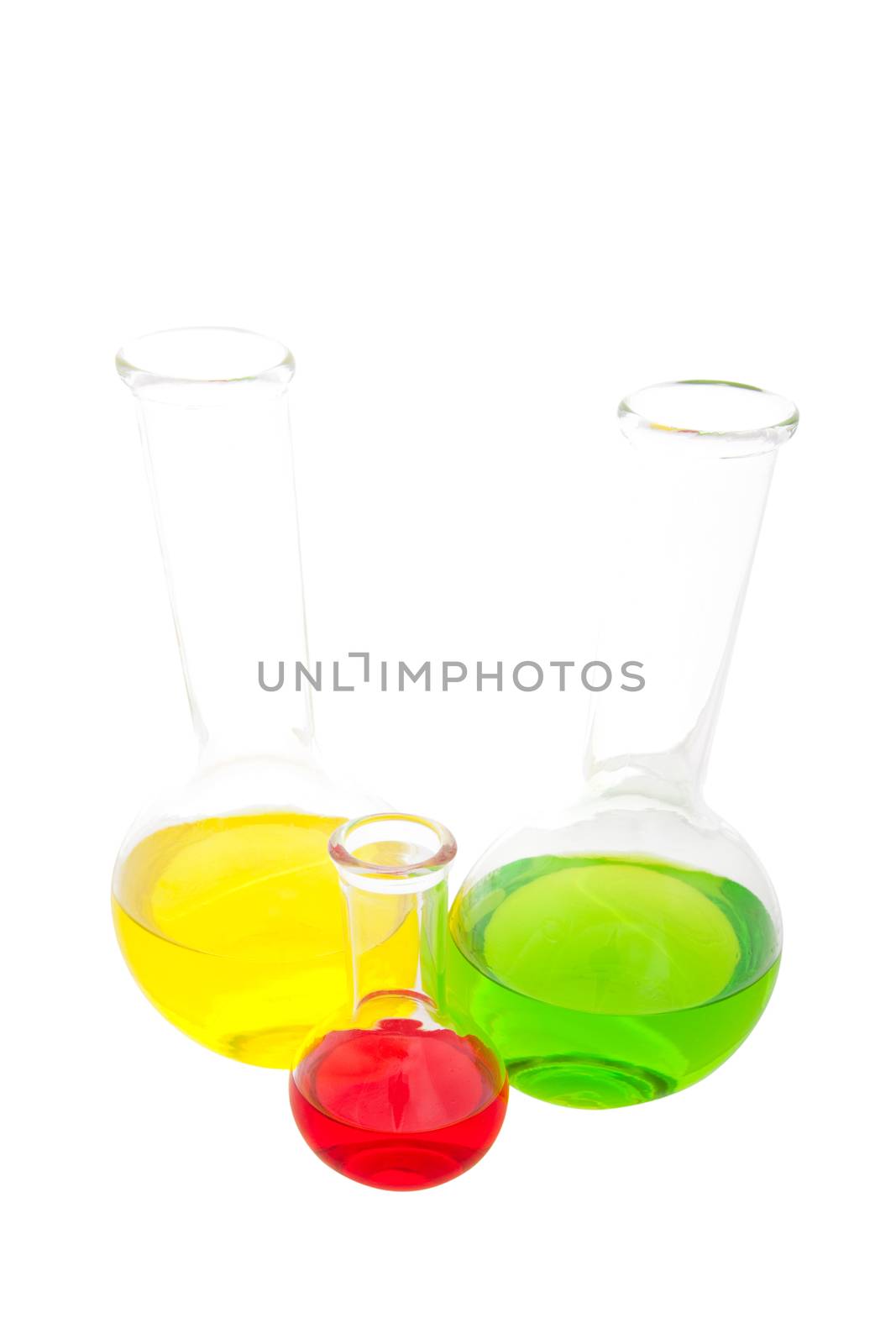 Laboratory glass containing various fluids from a wide angle perspective.  Shot on white background.