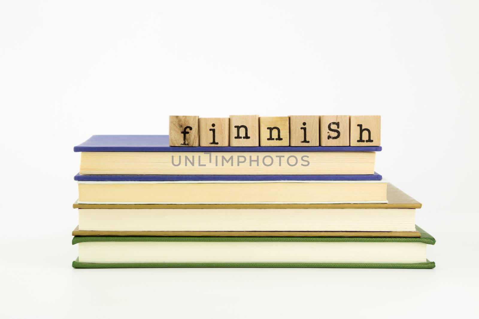 finnish language word on wood stamps and books by vinnstock