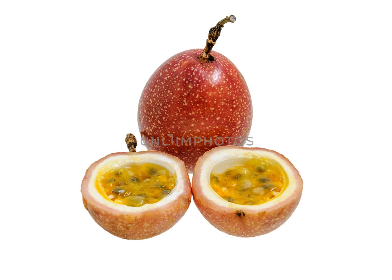 Passion fruit whole fruit and opened isolated on white background